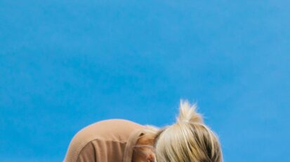 Woman hugging dog